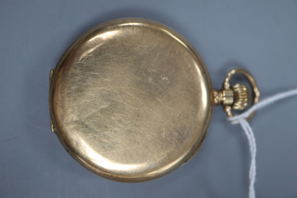 A 1920s 9ct gold open face keyless pocket watch, with Arabic dial and gilt metal cuvette, gross 66 grams,